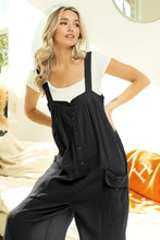 BiBi Gauze Buttoned Up Overall Jumpsuit in black gauze fabric, machine wash cold