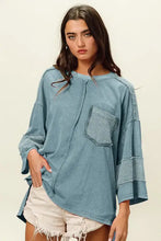 BiBi High-Low Washed T-Shirt in teal with exposed seams and textured pocket