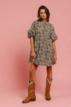 Bi bi leopard denim dress featuring black and white leopard print cotton with puffed sleeves and back contrast tie detail