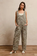 Woman in BiBi leopard print animal print wide-leg jumpsuit