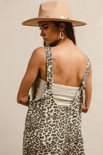 Back view of BiBi leopard print animal print denim overalls, machine wash cold