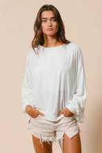 White oversized long-sleeve loop terry sweatshirt with relaxed fit and cut edge band ribbed cuffs by BiBi