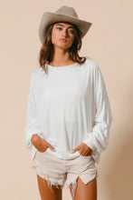 White loose-fitting BiBi loop terry pull over with cut edge band featuring long sleeves and dropped shoulders