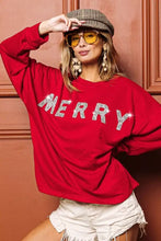Red long-sleeved christmas sweater with merry in silver rhinestones and relaxed drop shoulder design by bi bi