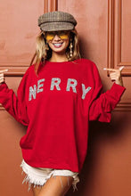Red relaxed drop shoulder sweater with merry in sparkling silver lettering by BiBi for Christmas wear