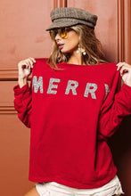 Red long-sleeved bi bi merry glitter christmas drop shoulder top with silver glitter merry lettering across chest