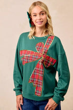 BiBi plaid ribbon bow detail christmas fleece pullover in green with red plaid bow and gold trim for best fit winter wear