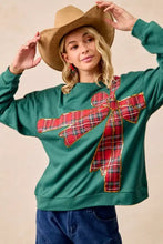 Green fleece pullover with large red and black plaid bow appliqué and gold trim for best fit christmas fleece pullover