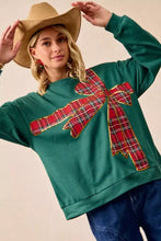 Emerald green fleece pullover with bold red plaid bow and gold trim offering the best fit christmas fleece pullover
