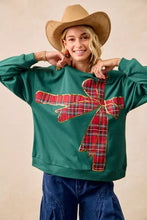 Green fleece pullover with a large red and gold plaid bow appliqué best fit for Christmas fleece pullover wear