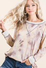A bibi tie dye terry pull over sweatshirt in muted beige and brown with contrast stitching and light gray ribbed neckline and cuffs