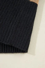 Black ribbed cardigan sweater with tan cuff detail