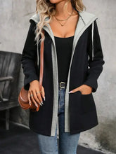Black and gray hooded coat with textured hood, pockets, and zipper closure