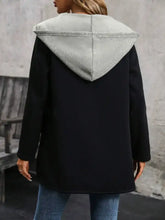 Black and gray hooded coat with textured hood and zipper closure