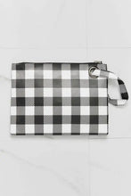 Black and white buffalo plaid printed wristlet clutch with zipper