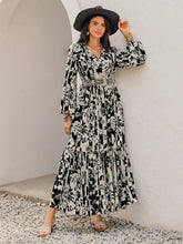 Black and White Floral Maxi Dress with Tie and Ruched Details Maxi Dresses
