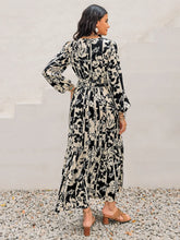 Black and White Floral Maxi Dress with Tie and Ruched Details