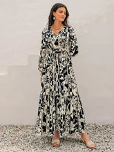 Black and White Floral Maxi Dress with Tie and Ruched Details Maxi Dresses