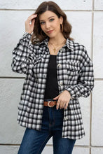 Black and white plaid dropped shoulder shirt jacket with button-down closure and pocket