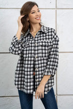 Black and white plaid dropped shoulder shirt jacket with button-down collar and pocket