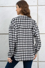 Black and white plaid dropped shoulder shirt jacket with button-down closure