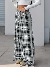 Black and white plaid wide-leg drawstring pants in cotton-poly blend
