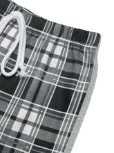 Black and white plaid wide-leg drawstring shorts in cotton-polyester blend