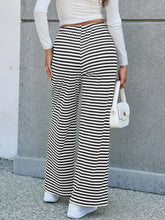 Black and white striped cotton wide-leg high-waist pants with white accents
