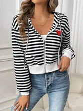 Black and white striped cotton zip-up hoodie with heart patch