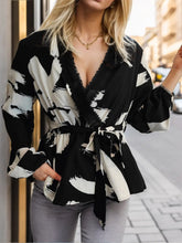 Black and White Wrap Blouse with Belted Waist and Medium Sleeve Length Black