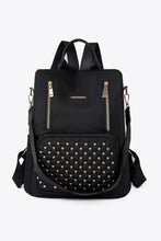 Black beaded backpack with gold zipper pocket and studded front