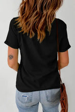 Black bunny graphic crop top in basic style with blue jeans
