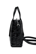 Black crinkled leather handbag with textured tote design and detachable strap