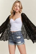 Black sequined kimono jacket with batwing sleeves and adora leaf pattern crochet design
