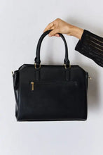 Black croc-embossed leather handbag with gold hardware