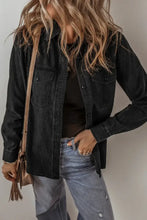 Black denim jacket with distressed details and patch pockets