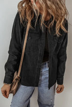 Black denim jacket with distressed details, button closure, and patch pockets
