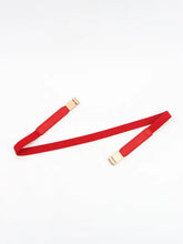 Black elastic skinny belt with gold buckle and red velvet accents for women