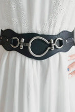 Black elastic waist belt with zinc alloy buckle and O-ring detailing