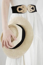 Black elastic waist belt with twisted alloy buckle and straw hat