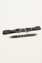 Black faux leather belt with symmetrical zinc alloy silver buckles