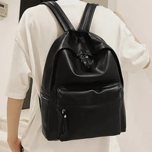 Black faux leather zip backpack bag with adjustable straps