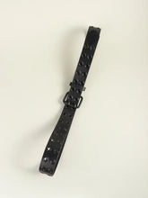 Black grommet PU leather belt with double buckle and dangling strap
