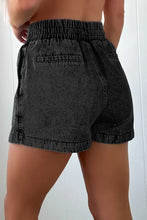 Black high waist acid wash denim shorts with drawstring and elastic waistband