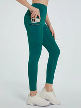 Black High-Waisted Athletic Leggings with Pockets Moderate Stretch Basic Style Dark Green Woman Leggings