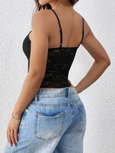 Black lace floral camisole top with spaghetti straps and low back