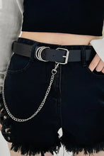Black leather alloy chain belt with silver buckle on frayed denim shorts