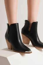 Black leather ankle boots with block heel and pointed metal tip toe