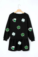 Black long-sleeve dress with green shamrock and beer mug print on hanger