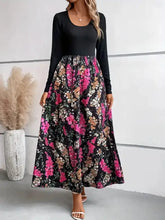 Black long sleeve maxi dress with vibrant floral round neck skirt